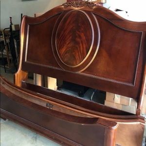 Queen size bed with side rails. Real wood.